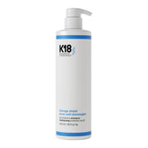 K18 frente del empaque mostrando botella y volumen para uso prolongado