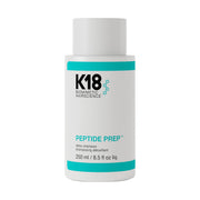 K18 envase frontal del champú prep detox mostrando volumen y fórmula segura para color