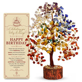 KarmaPledge front view of Tree of Life showing colorful chakra crystals and elegant silhouette