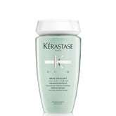 KÉRASTASE botella frontal Bain Divalent mostrando diseño y beneficio de limpieza equilibrada