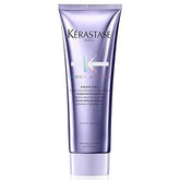 KÉRASTASE bottle front view showing brand and product benefits for repair