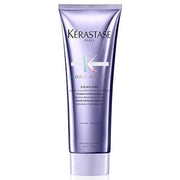 KÉRASTASE bottle front view showing brand and product benefits for repair