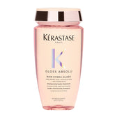 KÉRASTASE botella frontal mostrando diseño y beneficios de brillo