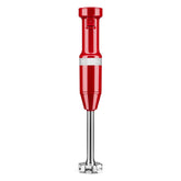 KitchenAid hand blender front view in empire red showing compact control and easy grip