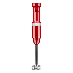 KitchenAid hand blender front view in empire red showing compact control and easy grip