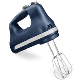 KitchenAid hand mixer front view in Ink Blue showing controls and compact design for easy handling