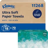 Kleenex caja pop-up frontal mostrando presentación profesional y fácil acceso