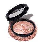 LAURA GELLER compact closed showing sleek front, convenient travel-ready