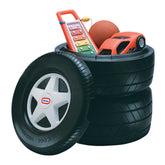 Little Tikes cofre frontal mostrando diseño de neumático y almacenamiento práctico