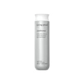 Living Proof botella frontal mostrando etiqueta y beneficio volumen