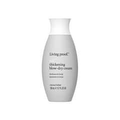Living Proof envase frontal del producto mostrando marca y tamaño 4 oz, ideal para volumen