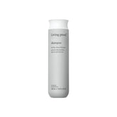 Living Proof envase frontal mostrando diseño y beneficio volumen