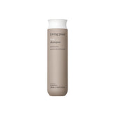 Living Proof botella frontal 8 oz mostrando diseño y beneficio anti-frizz