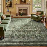 Lofus rug front view showing full green faded floral design and vintage look