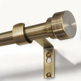 Lootkell curtain rod front view showing antique bronze finish and elegant silhouette benefit: stylish support