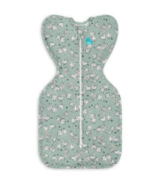 Love to Dream Swaddle Up front view in olive showing snug shoulder fit and safer sleep