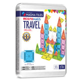 MAGNA-TILES estuche metálico frontal mostrando las 55 piezas y fácil transporte