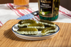Maille frasco abierto con cucharita listo para servir y añadir sabor