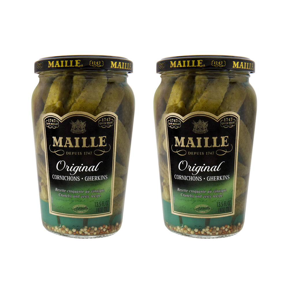 Maille frasco frontal mostrando cornichons crujientes para aperitivos