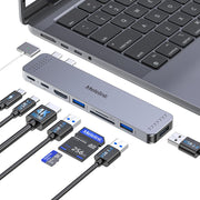 Melelink adaptador frontal junto al puerto del MacBook, ofrece más puertos prácticas