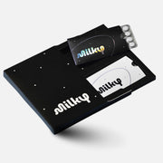 Milky front packaging cosmic black showing sleek compact bottle and brand