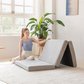 MLILY colchón tri-fold frontal mostrando superficie y doble función portátil