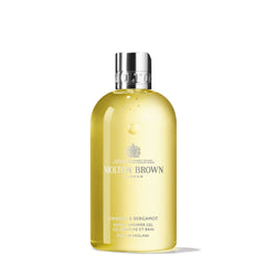 Molton Brown botella frontal Orange & Bergamot mostrando diseño y beneficio aromático
