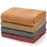 Momcozy swaddles pack front showing four blankets and soft look