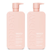 MONDAY HAIRCARE set frontal mostrando botellas rosas y beneficio suavidad