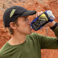 Nathan SpeedDraw Plus zippered pocket open showing phone and keys for secure storage