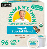 Newman's Own caja frontal del pack de 96 cápsulas mostrando marca y beneficio orgánico