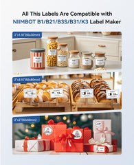 NIIMBOT B1 open label bin displaying loaded 50×30mm roll for quick cartridge change