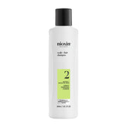 Nioxin System 2 frente del envase mostrando producto y beneficios