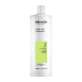 NIOXIN envase frontal mostrando diseño profesional y beneficio de densidad