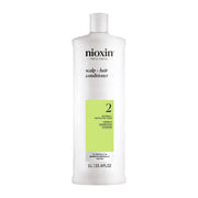 NIOXIN System 2 front bottle showing branding and fuller-hair benefit