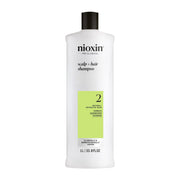 NIOXIN envase frontal mostrando diseño profesional y limpieza profunda