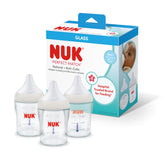 NUK biberón frontal de vidrio mostrando diseño limpio y capacidad