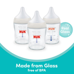 NUK biberón lateral con tapa segura para almacenamiento higiénico