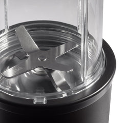 NutriBullet cups and flip-top lids arranged showing portability and convenience