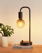 ONEWISH front view showing lamp silhouette and warm glow, ideal bedside ambience