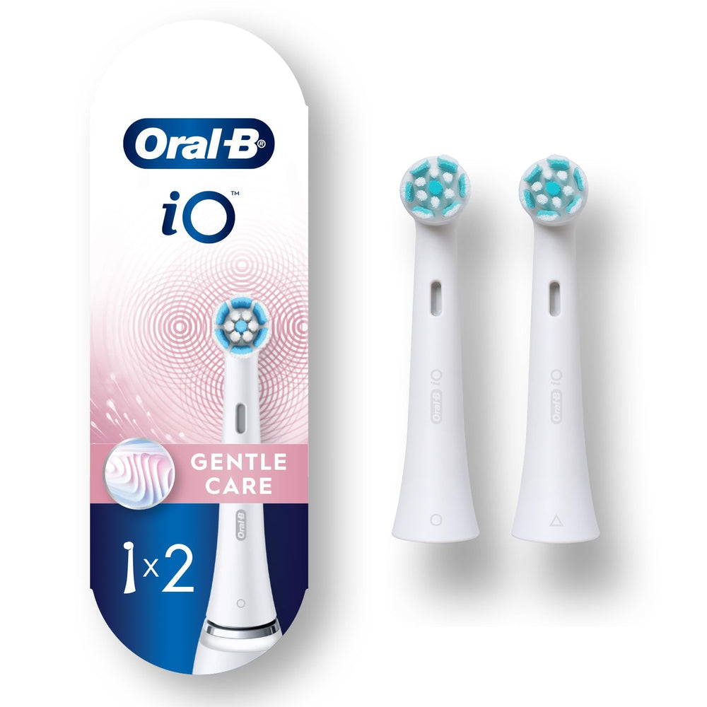 Oral-B iO empaque frontal mostrando dos cabezales y compatibilidad