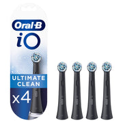 Oral-B iO front packaging showing four black replacement heads and benefits