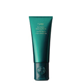 Oribe envase frontal Curl Control crema mostrando marca y presentación elegante