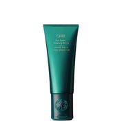 Oribe envase frontal Curl Control crema mostrando marca y presentación elegante