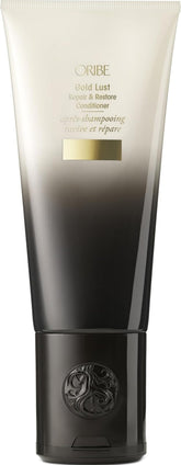 Oribe Gold Lust front view showing elegant bottle and restorative conditioner benefit