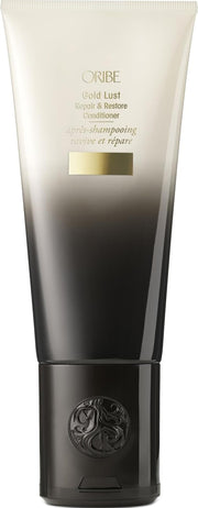 Oribe Gold Lust front view showing elegant bottle and restorative conditioner benefit
