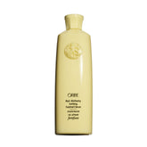 Oribe Hair Alchemy front bottle showing elegant packaging and brand luxury