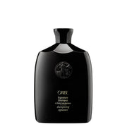 Oribe botella frontal mostrando el diseño de marca y beneficio profesional
