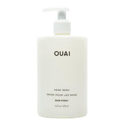 OUAI botella frontal mostrando diseño y volumen, aspecto premium