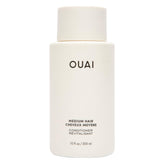 OUAI medium conditioner front bottle view showing clean design and benefits
